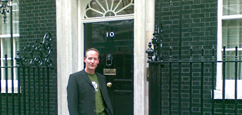 Simon wears WordPress t-shirt outside No10